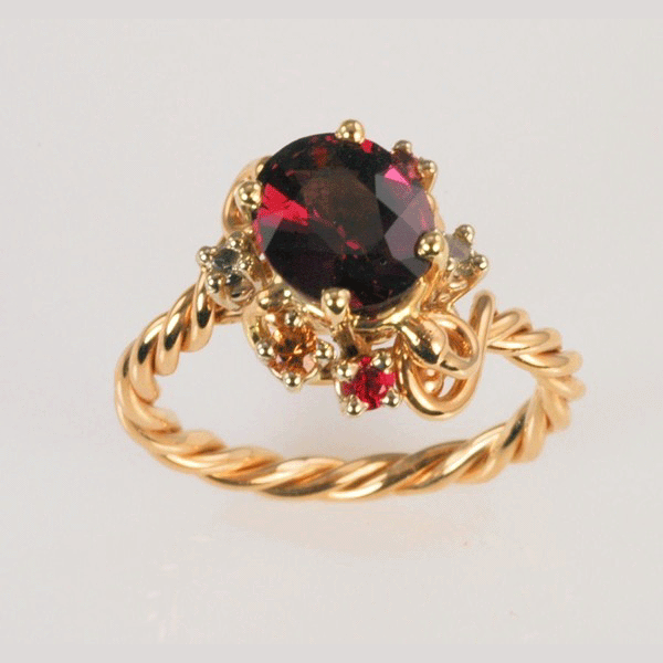 Purple-red Spinel and &quot;Stardust&quot; Sapphires Ring