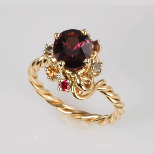 Purple-red Spinel and &quot;Stardust&quot; Sapphires Ring